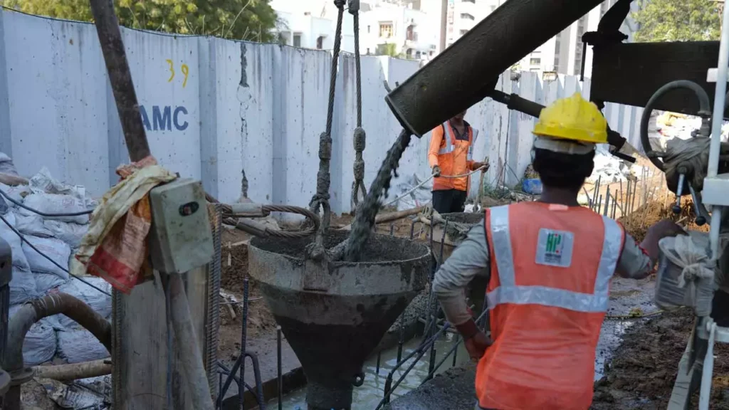 Ready-mix-concrete being poured into an excavated part for diaphragm wall